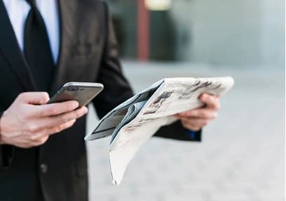 Media professional reviewing news content