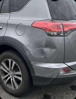 In-painted vehicle damage on an authentic claim photo