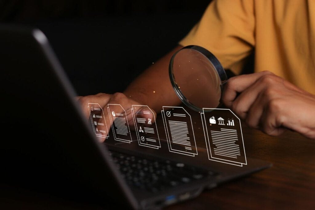 Document management system dms being setup by it consultant working on laptop